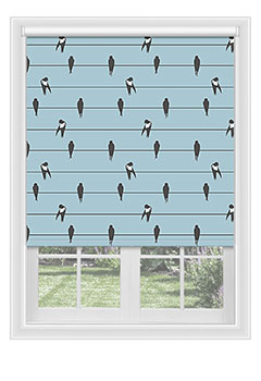 Keswick Swallows - Blackout blind with black & white swallows on a sky blue background. Available with a white plastic or chrome chain.

