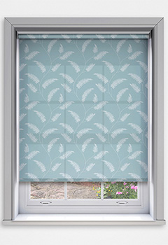 Sephora Azure Dimout - The Sephora Azure Dimout Roller Blind features a delicate fern pattern on a tranquil blue background, bringing a sense of calm and natural elegance to your space. Custom-made for a perfect fit, this blind softly filters light, offering an ideal combination of privacy and gentle illumination. Thoughtfully designed for ease of use and child safety, it is available with a standard sidewinder chain or an optional spring tension control with decorative pulls. A stylish and serene choice for any room.
