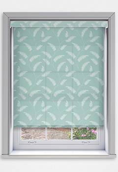 Sephora Sage Dimout with Cassette - The Sephora Sage Dimout Cassette Roller Blind features a subtle fern pattern on a soothing green backdrop, adding a nature-inspired tranquillity to your home. Custom-made for a perfect fit, it softly filters light to create a cosy ambience. The blind includes a 70mm cassette fascia with a fabric insert as standard, with plain options in white, black, or anthracite. A fabric-wrapped bottom bar and optional no-drill Grip Fit bracket for recessed windows ensure a blend of effortless style and functionality.
