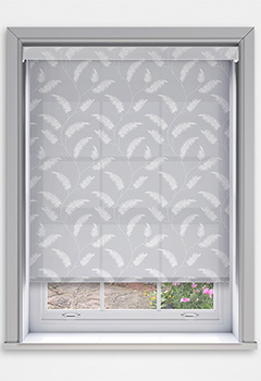 Sephora Steel Dimout with Cassette - The Sephora Steel Dimout Cassette Roller Blind showcases a subtle fern pattern on a soft grey backdrop, bringing a touch of nature-inspired elegance to any room. Designed to filter light, it fosters a calming and welcoming ambience. Made to measure for a flawless fit, it comes with a 70mm cassette fascia featuring a fabric insert as standard, with plain options in white, black, or anthracite. A fabric-wrapped bottom bar and optional no-drill Grip Fit bracket designed for recessed windows add style and convenience.
