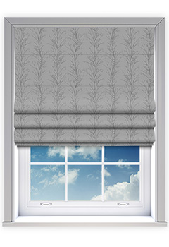 Treviso Shadow - The Treviso Shadow Roman Blind showcases a striking forest-inspired design in elegant grey tones, with delicate branches set against a metallic base for captivating contrast. Its textured print enhances depth and dimension, creating a versatile window dressing that balances modern sophistication with a natural aesthetic. Expertly made to measure, this Roman blind comes fully lined as standard, with the option of blackout lining for light control or thermal interlining for insulation, ensuring both style and practicality for any home.
