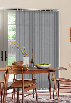 Henlow Shadow - Grey is the in colour. This vertical blind has a weave with a two tone combination and will suit any decor. Available in an 89mm slat width only.
