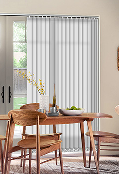 Sale Frost - Bright plain white vertical blind, this dim out fabric will filter the light and still give you privacy. This 89mm louvre is supplied with a white headrail.

