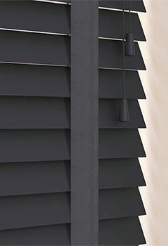 Empire 50mm Basswood & Dusk Tape - Our empire 50mm basswood blinds, tailored to your specific requirements, along with the corresponding tape, make an ideal enhancement to any room. These contemporary charcoal wooden blinds come in a maximum width of 240.0cm and are available with slat widths of 50mm.
