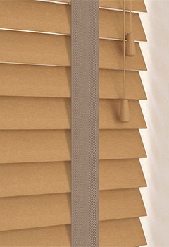 Soho 50mm Basswood & Canvas Tape - Discover our tailor-made Soho and Canvas Tape wooden blinds, featuring a 50mm slat width and embellished with exquisite decorative tape. These brown basswood blinds provide a fresh take on conventional window adornments, offering a blend of contemporary style and timeless charm. Elevate your interior with our tape option for a truly modern aesthetic.
