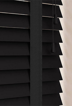 Volt 50mm Basswood & Smoke Tape - Embrace the enduring allure of black with a contemporary edge by opting for Volt & Smoke Tape basswood wooden blinds. The 50mm slat width caters to all windows, ensuring both light control and privacy. The inclusion of decorative tape effortlessly elevates the refinement of your living space.
