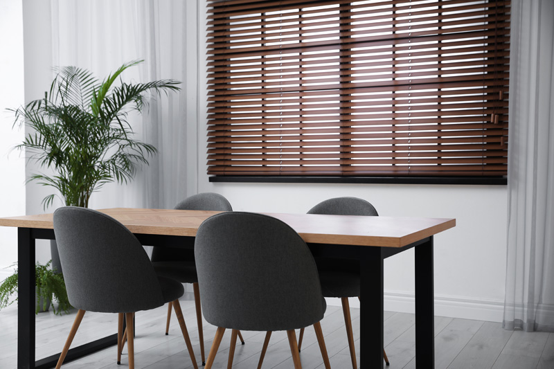 Lowering Wooden Blinds Lowering Wooden Blinds