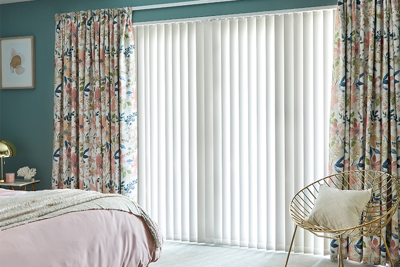 Do vertical blinds go well with curtains?